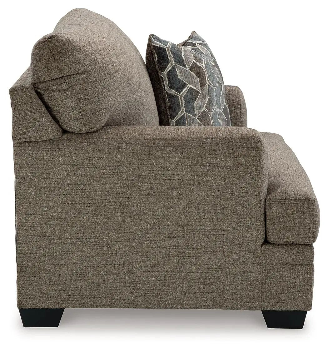 Stonemeade armchair in taupe textured fabric with geometric pillow by Unique Piece Furniture on Tampa Home & Garden Store