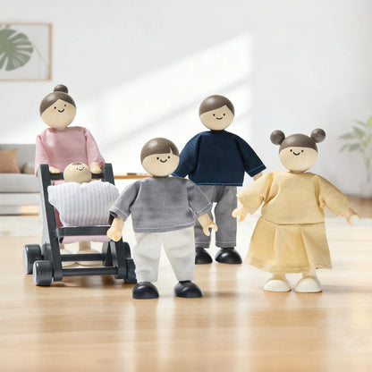 Dollhouse dolls by Tiny Land INC; five wooden figures in pastel outfits with a baby in stroller on Tampa Home & Garden Store