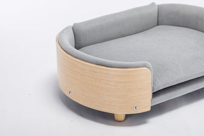 Scandinavian style elevated dog bed with light grey velvet cushion and curved wood frame mid size on Tampa Home & Garden Store