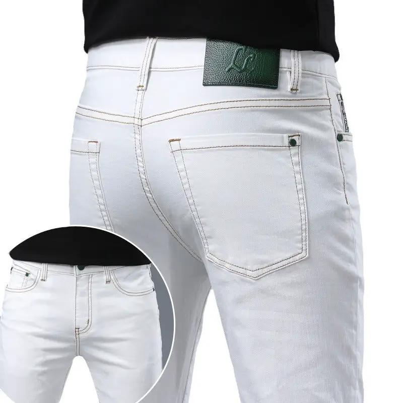 White washed men's jeans with stitching, back pockets and FLIPSTYLEZLLC logo patch on waistband on Tampa Home & Garden Store