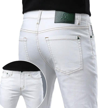 White washed men's jeans with stitching, back pockets and FLIPSTYLEZLLC logo patch on waistband on Tampa Home & Garden Store