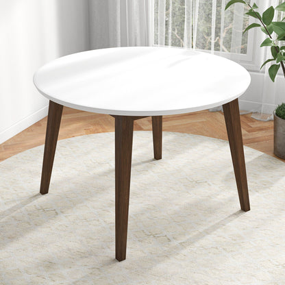 White solid wood round dining table with water-resistant finish and dark wood legs on Tampa Home & Garden Store