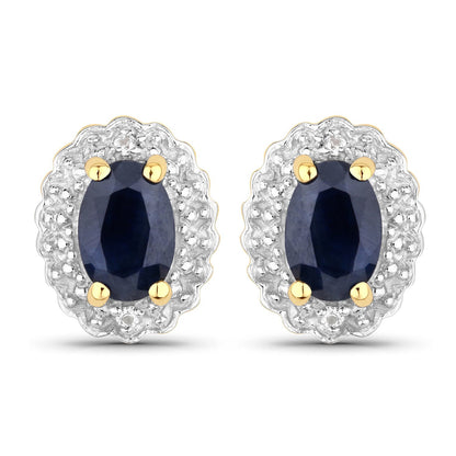Pair of .925 silver earrings with oval blue sapphire centers, white topaz halo and gold prongs on Tampa Home & Garden Store