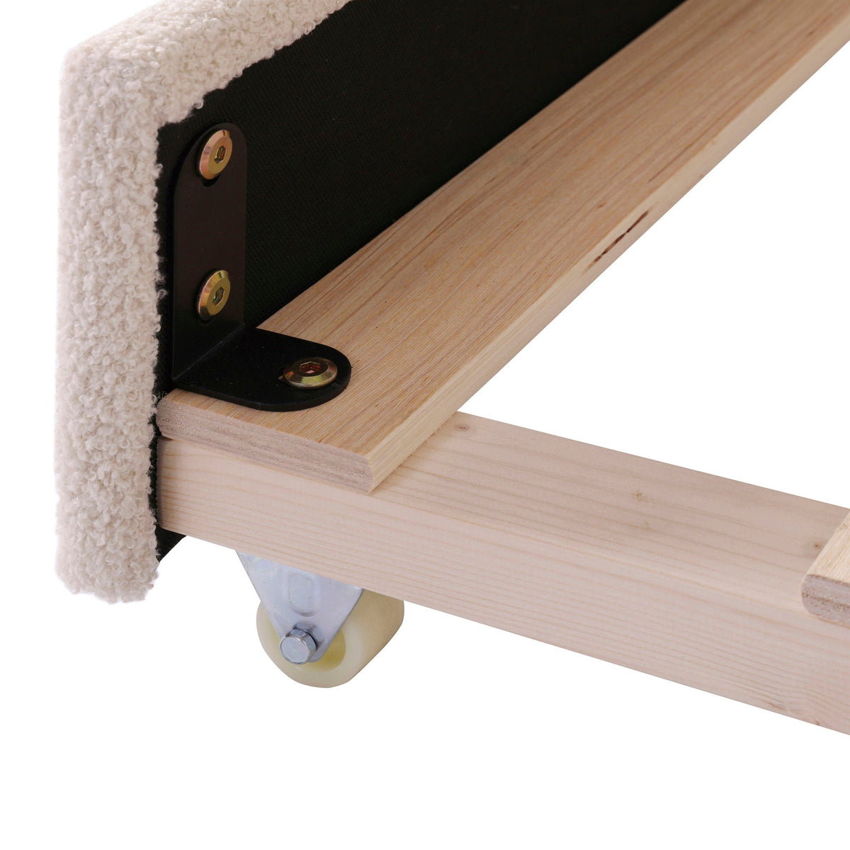 Upholstered daybed with trundle and storage armrests, light wood frame, caster wheels on Tampa Home & Garden Store