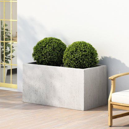 Modern Outdoor Planter by HouseOfZazla, gray concrete planter with two spherical shrubs on Tampa Home & Garden Store