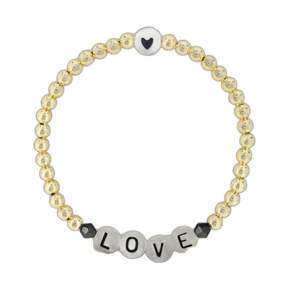 Lorelai Love 14k gold-filled 4mm bead bracelet with white heart bead and LOVE letter beads on Tampa Home & Garden Store
