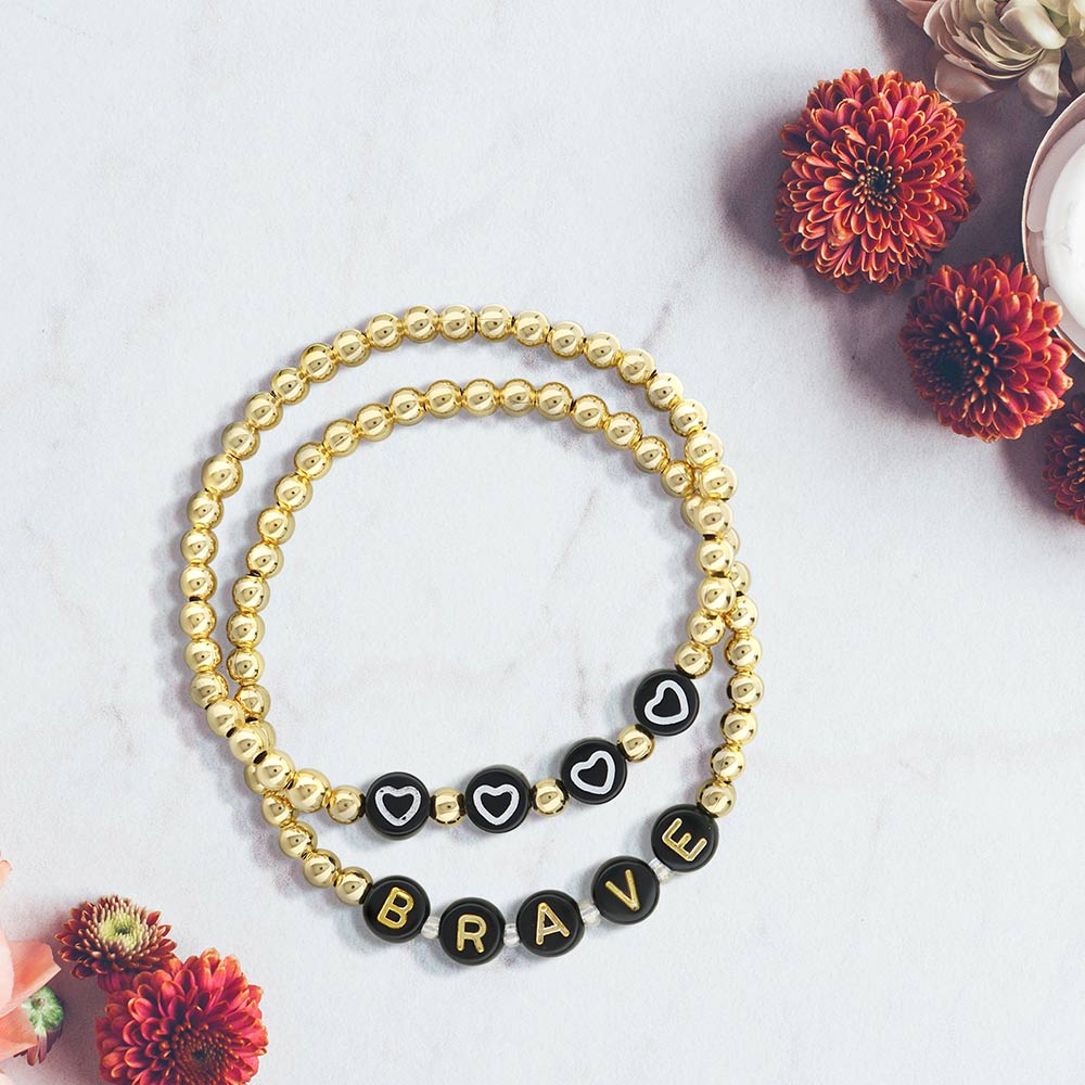 Lorelai Brave 14k gold-filled 4mm bead bracelet with black letter beads BRAVE and heart accents on Tampa Home & Garden Store