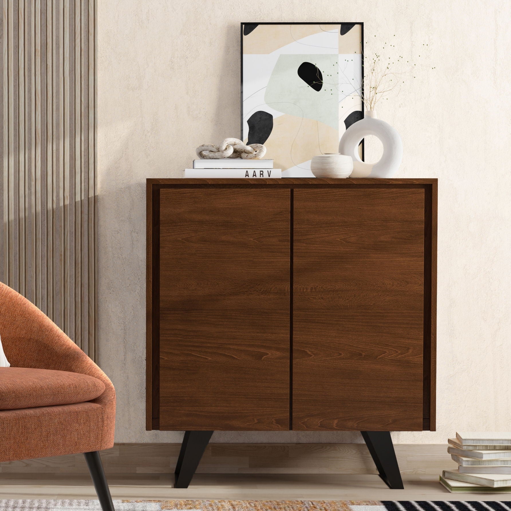 Lowry handcrafted medium storage cabinet in walnut with black legs; abstract art and books on Tampa Home & Garden Store