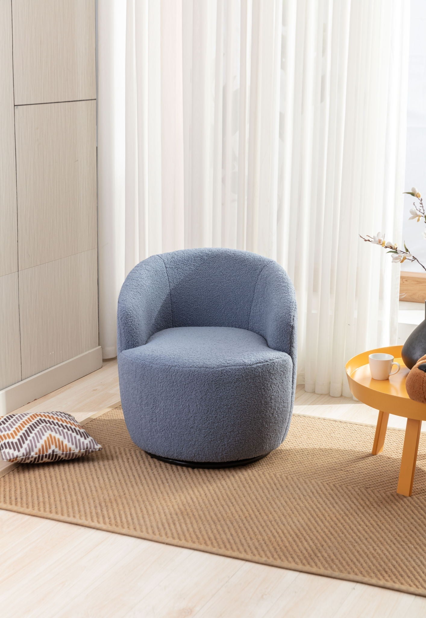 Teddy Fabric and Swivel Barrel Accent Chair