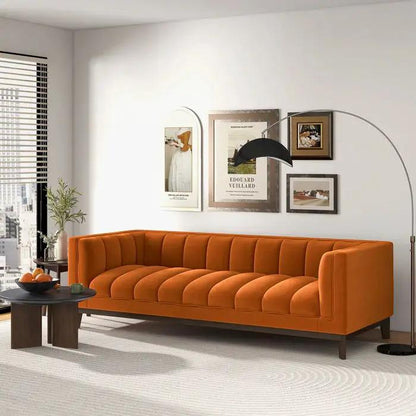Melissa mid-century modern sofa orange velvet with channel tufting and dark wood legs on Tampa Home & Garden Store