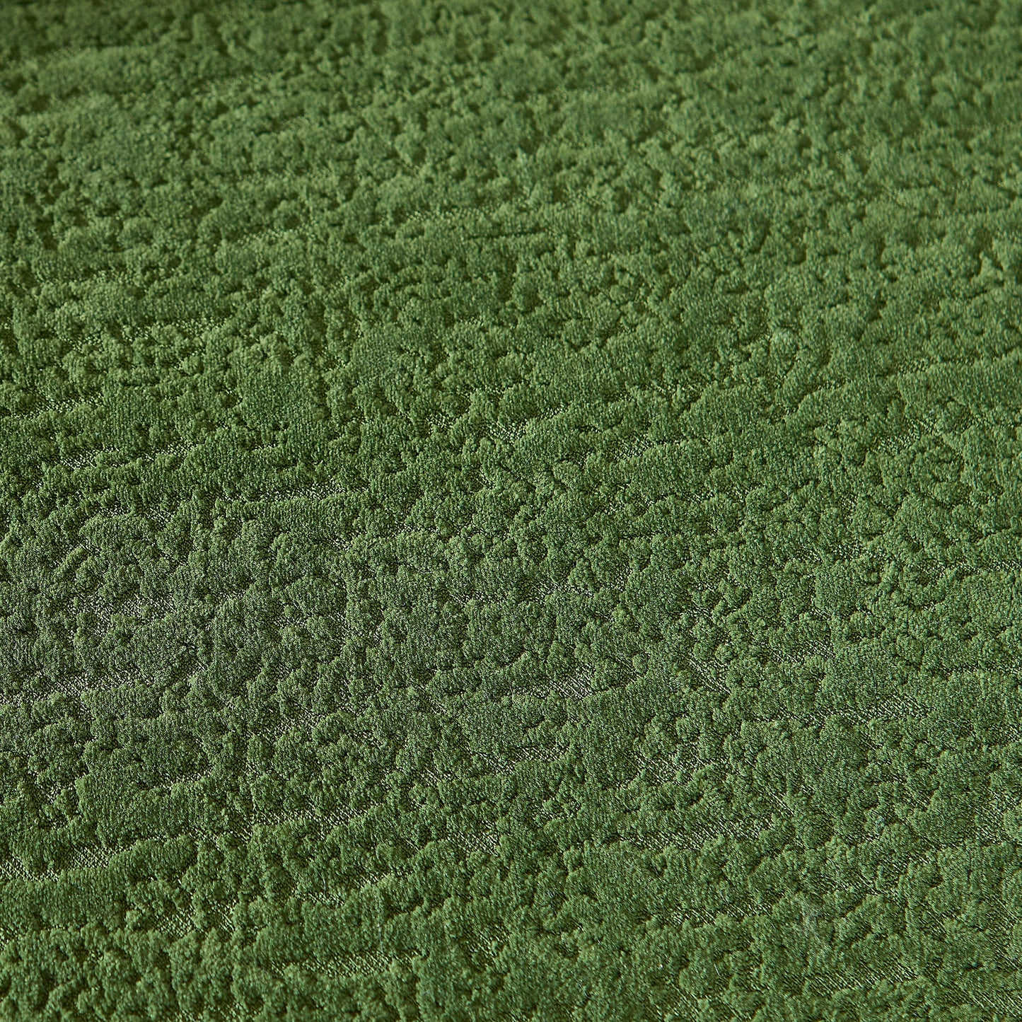 Green loop-pile carpet texture close-up with dense fibers, ideal for living room decor on Tampa Home & Garden Store