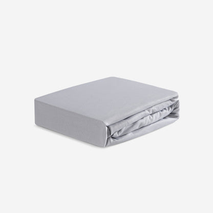 BedGear Hyper-Linen crib sheet light grey by HouseOfZazla, folded on Tampa Home & Garden Store