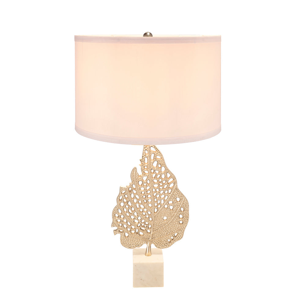 Table lamp D15x29.3in with cream drum shade and gold leaf base on marble pedestal on Tampa Home & Garden Store