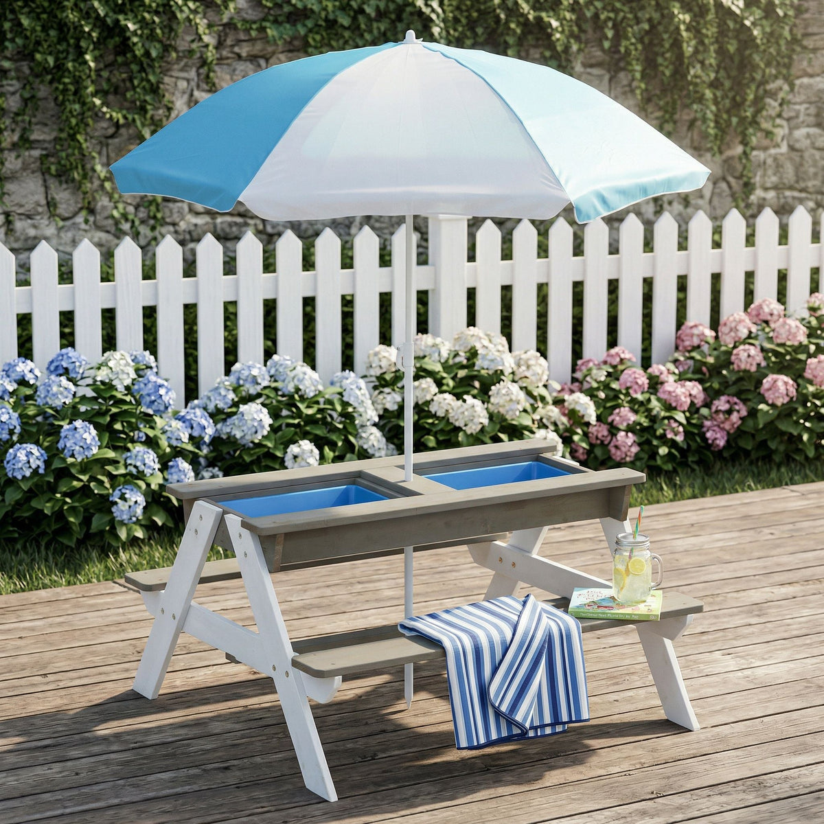 Kids picnic table with sand and water conversion, cedar outdoor table with blue troughs on Tampa Home & Garden Store