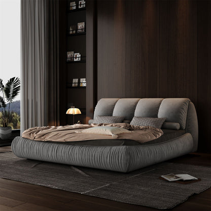Upholstered platform bed with oversized padded backrest and solid wood frame in gray fabric on Tampa Home & Garden Store