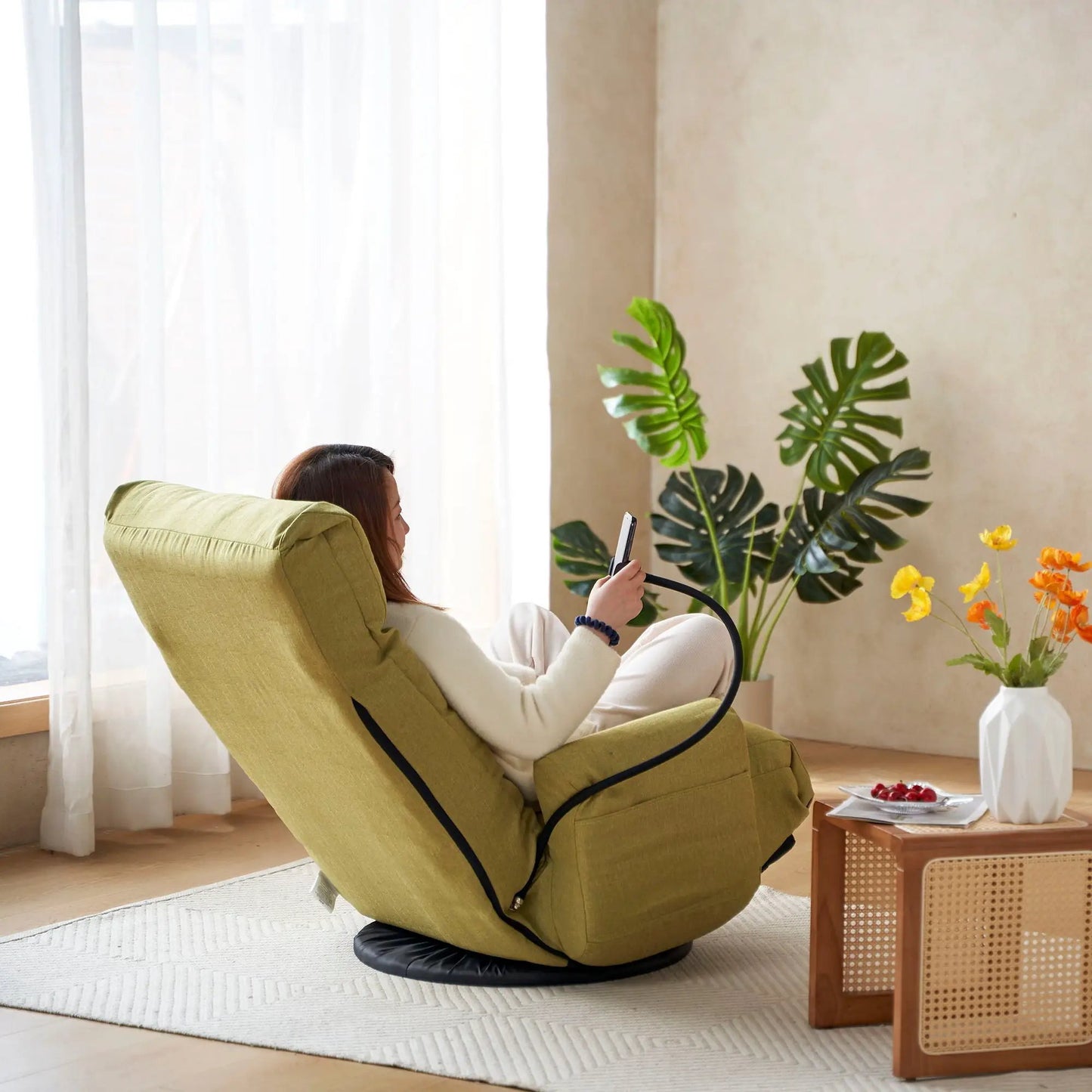 Adjustable swivel lounge chair in olive green fabric with 360 rotation and headrest on Tampa Home & Garden Store