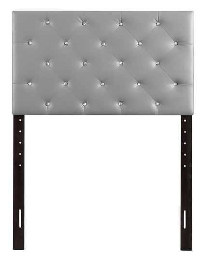 Upholstered headboard in gray faux leather with diamond tufting and crystal buttons, dark legs on Tampa Home & Garden Store