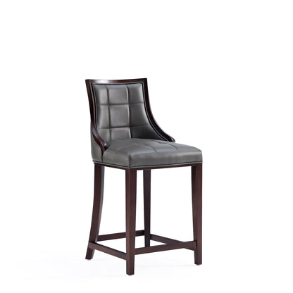 Bar height stool with solid dark wood frame and gray tufted leather cushion on Tampa Home & Garden Store