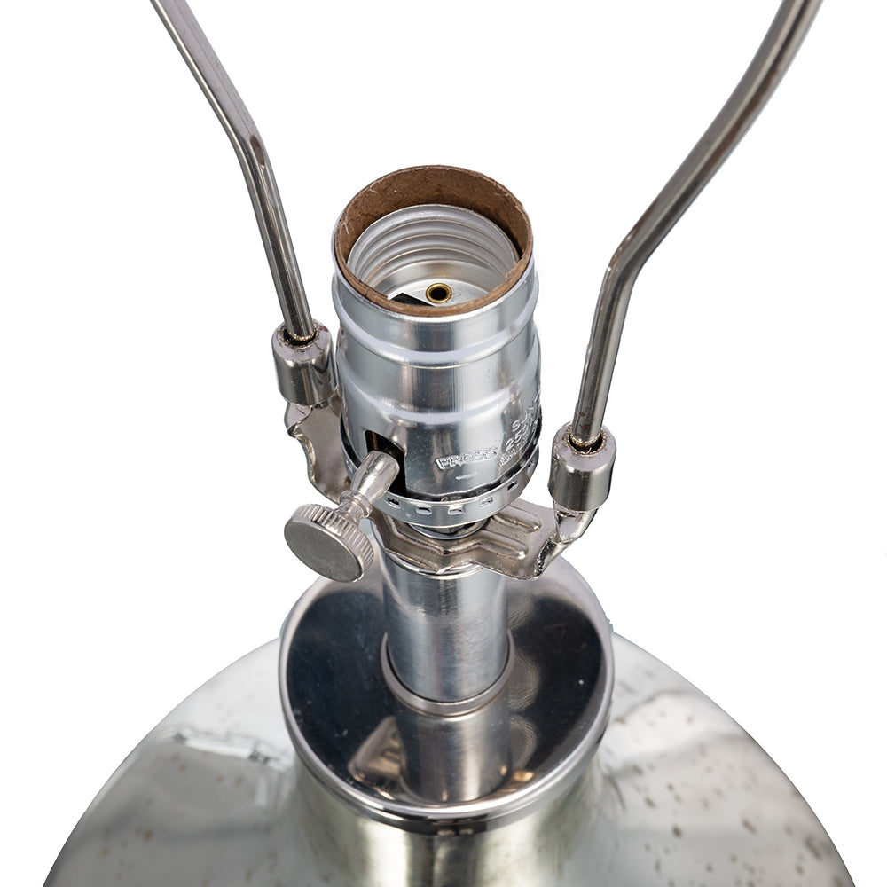 Silver table lamp base with exposed socket and metal harp for shade on Tampa Home & Garden Store