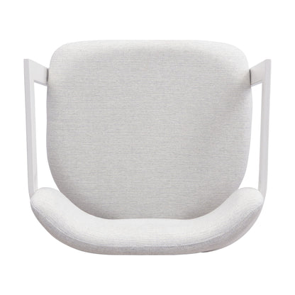 Upholstered dining armchair with soft gray fabric and white legs on Tampa Home & Garden Store