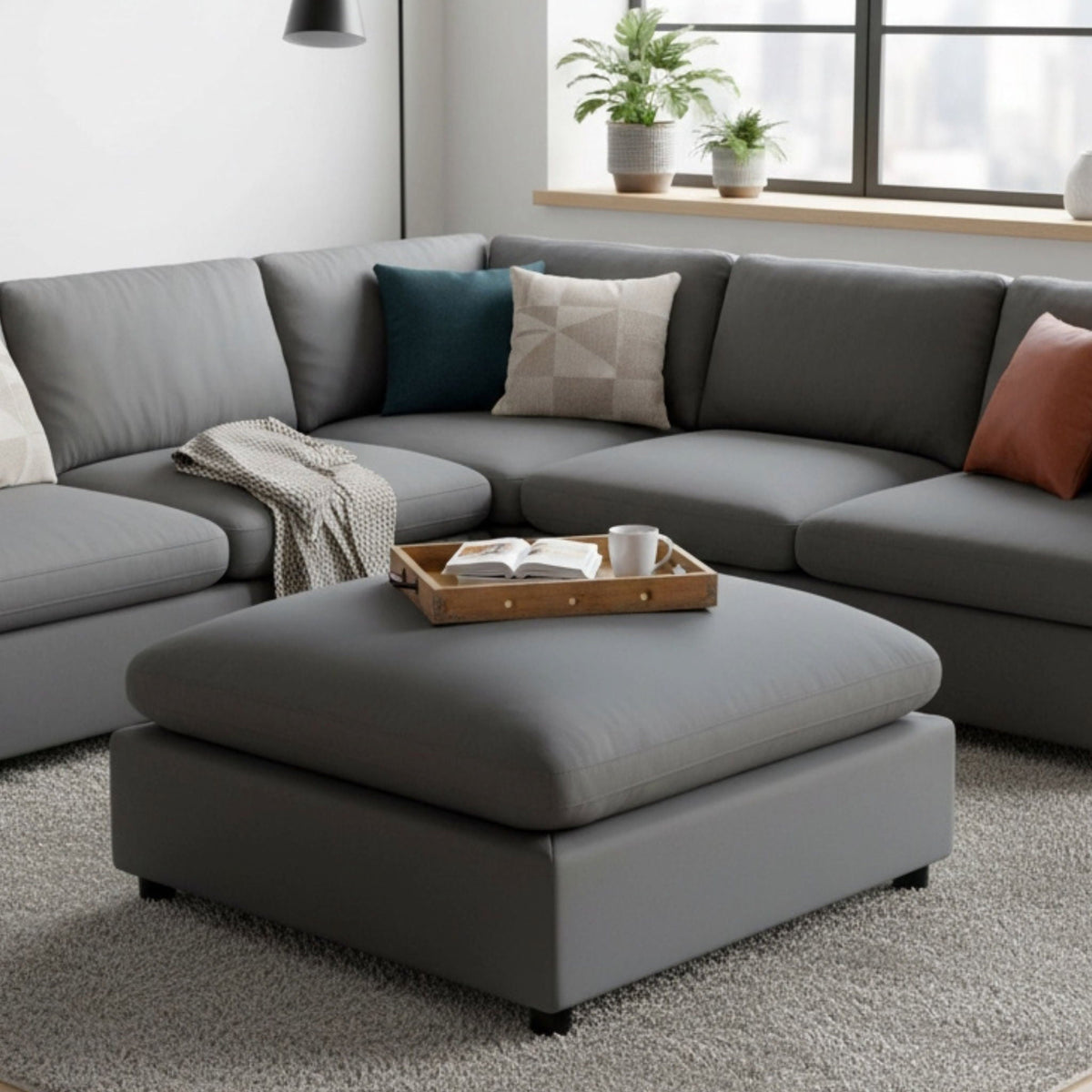 Caylie upholstered ottoman with removable covers by HouseOfZazla in dark gray on Tampa Home & Garden Store