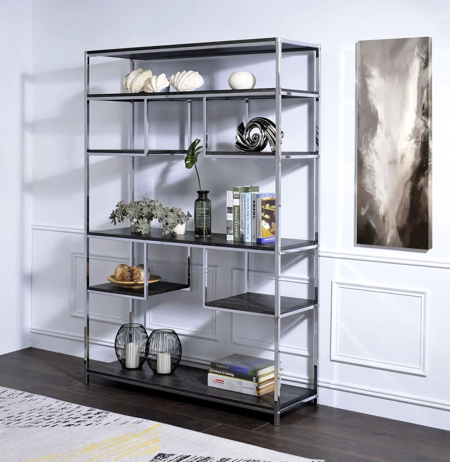 Vonara etagere bookshelf with chrome frame and gray oak shelves, styled with shells and books on Tampa Home & Garden Store