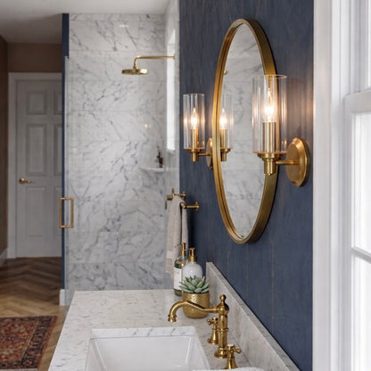 Jardin single light wall sconce with clear ribbed satin glass shades and gold finish on Tampa Home & Garden Store