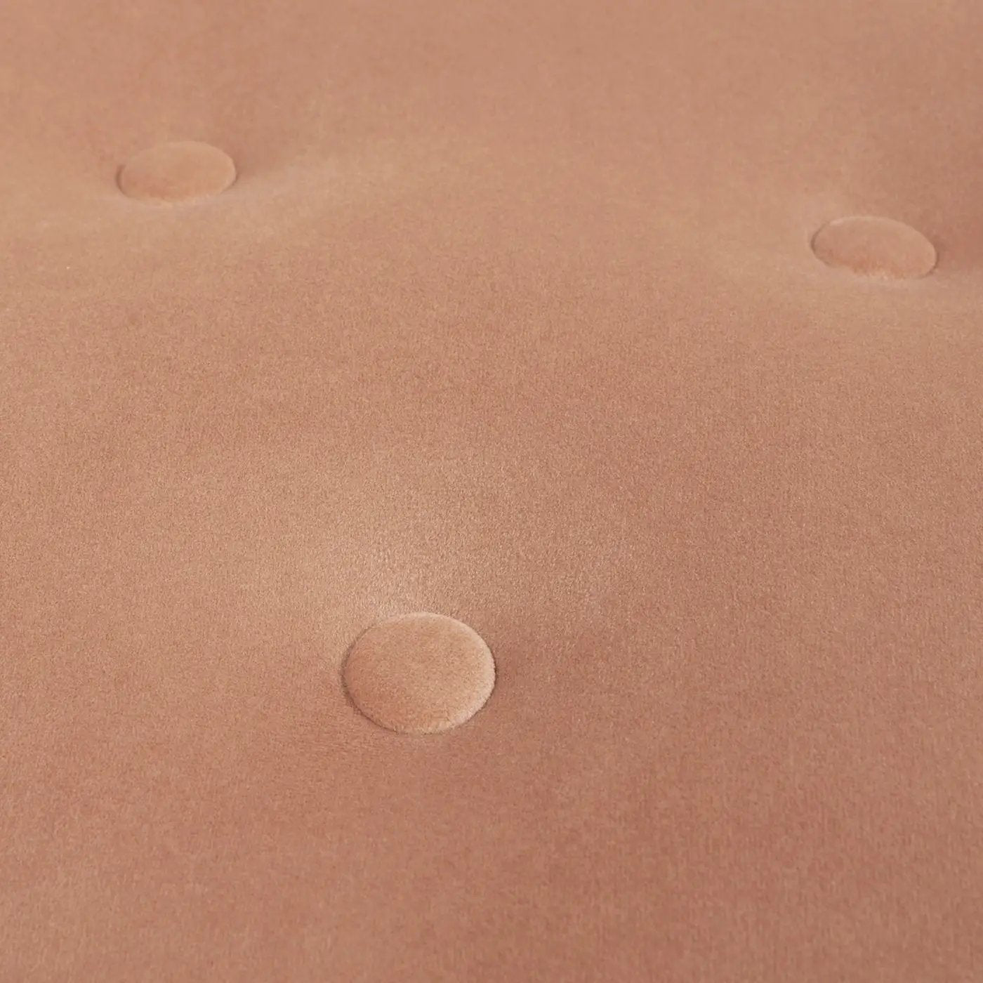Yolanda round upholstered ottoman in warm terracotta fabric with tufted button details on Tampa Home & Garden Store