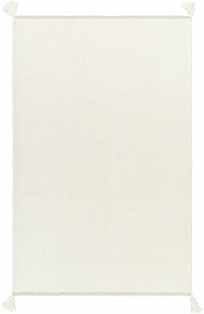 Niabi Area Rug by Boutique Rugs in ivory cream with tassels at corners on Tampa Home & Garden Store
