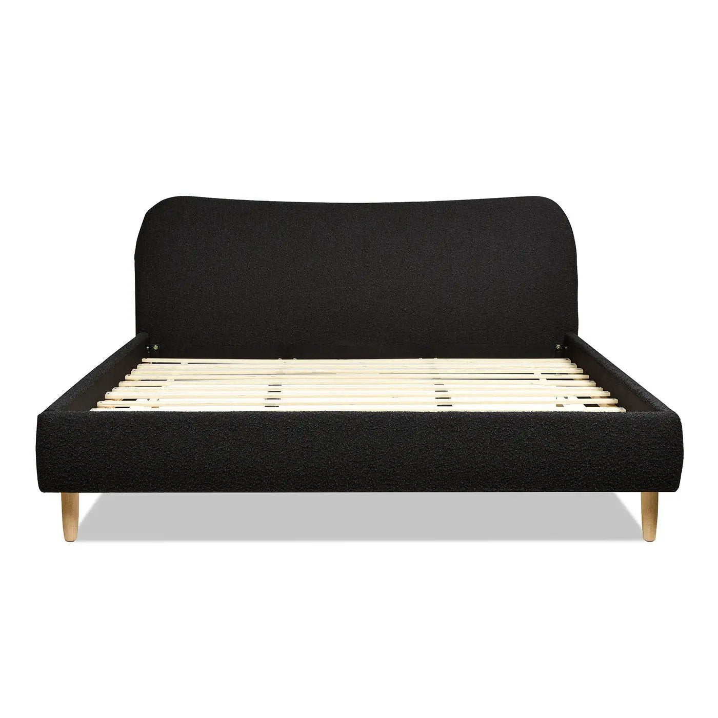 Roman curved headboard upholstered platform bed in black fabric with wood legs on Tampa Home & Garden Store
