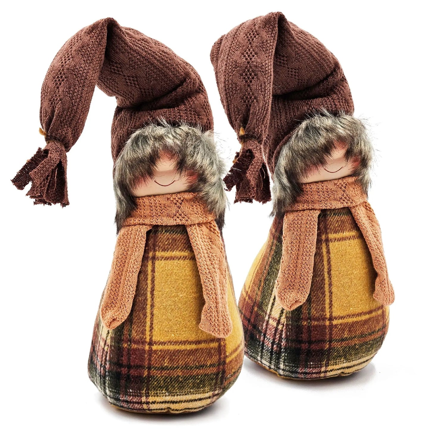 Two gnome decorations in brown knit hats with plaid yellow outfits and fur trim on Tampa Home & Garden Store