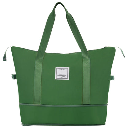 Green HouseOfZazla duffel bag with wide handles and adjustable strap front label patch on Tampa Home & Garden Store