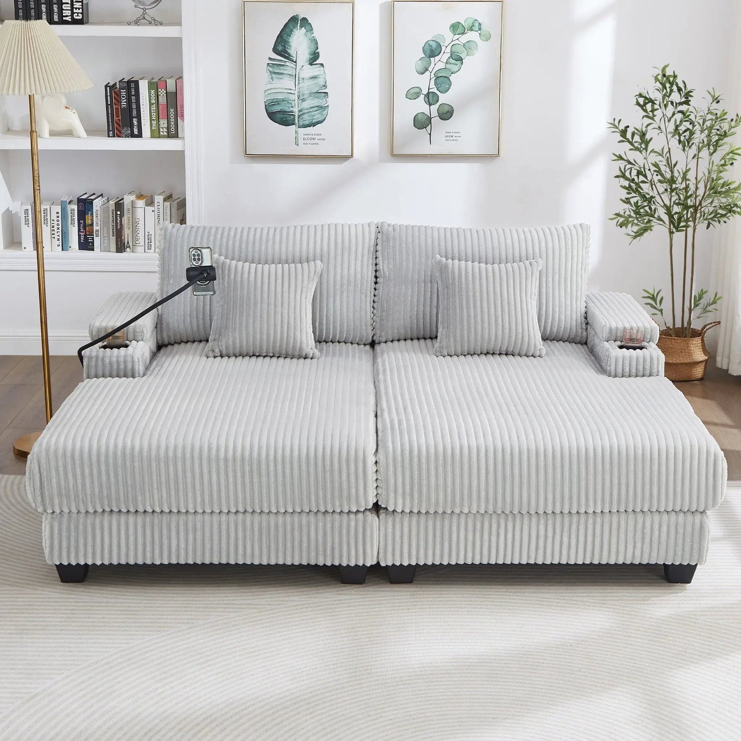 Modern gray ribbed fabric chaise sofa sectional with cushioned arms in a bright living room on Tampa Home & Garden Store