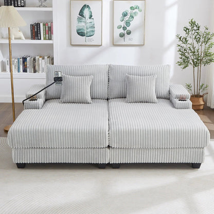 Modern gray ribbed fabric chaise sofa sectional with cushioned arms in a bright living room on Tampa Home & Garden Store