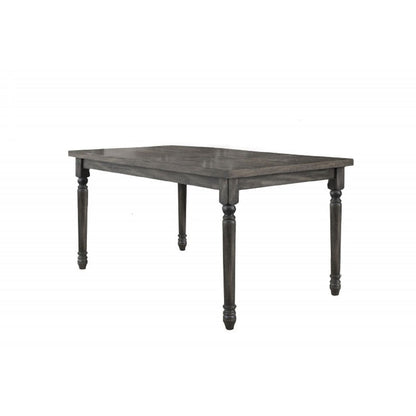 Rectangular gray wooden dining table with turned legs on Tampa Home & Garden Store