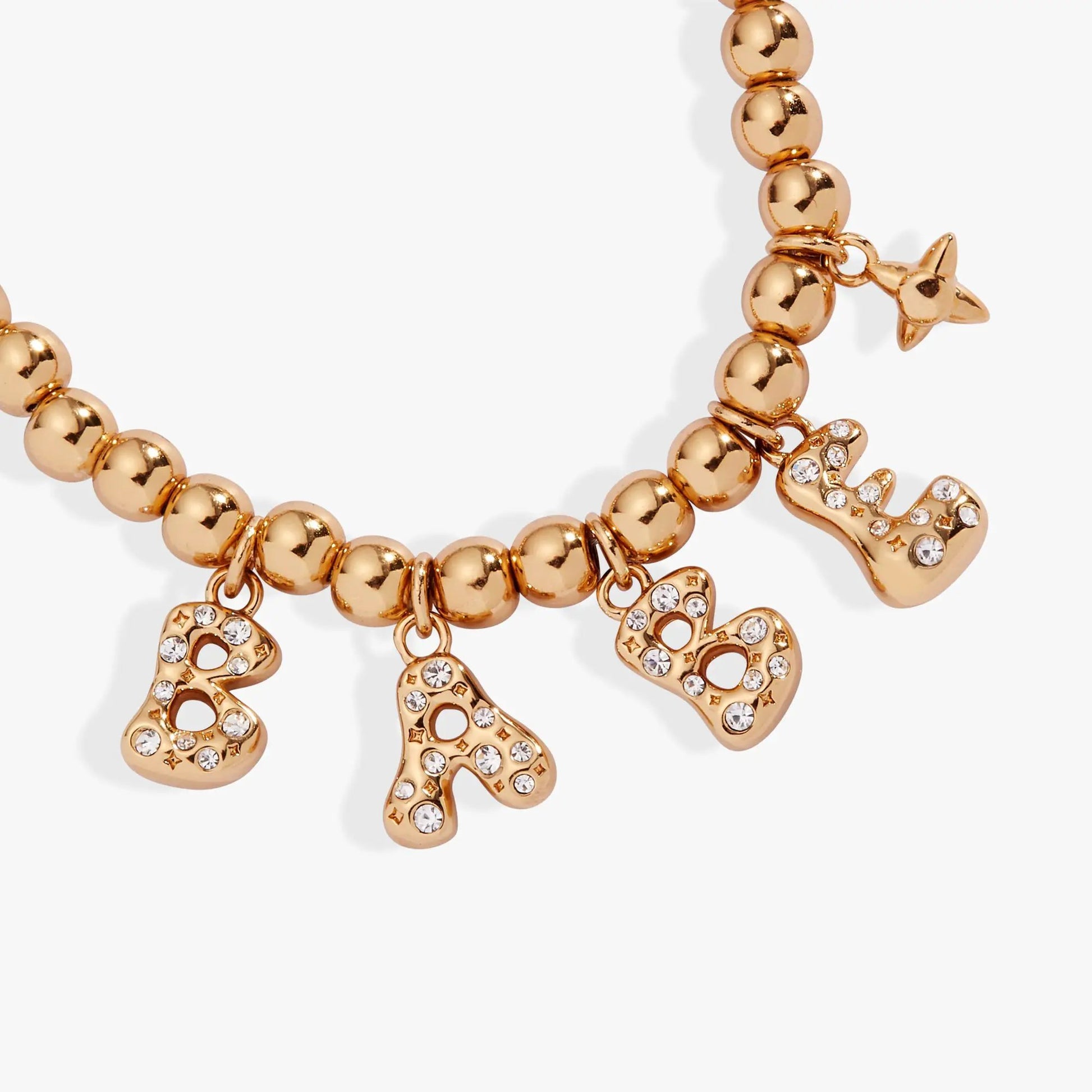 Babe Bubble Beaded Bolo Bracelet by Alex and Ani with gold-tone beads and crystal bow charms on Tampa Home & Garden Store