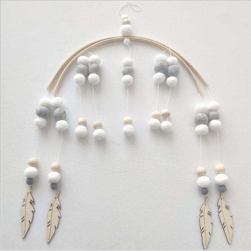 Stevvex crib mobile with Nordic wooden beads, white grey wool balls, two beige feather charms on Tampa Home & Garden Store