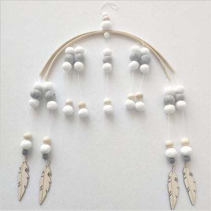 Stevvex crib mobile with Nordic wooden beads, white grey wool balls, two beige feather charms on Tampa Home & Garden Store