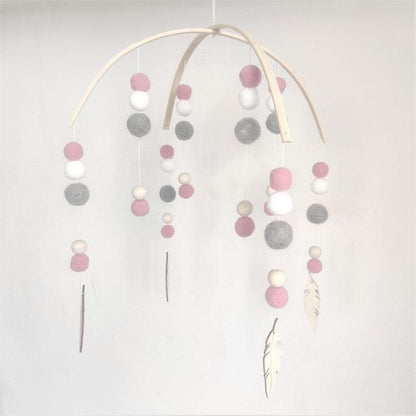 Baby Nordic wooden bead wind chime crib mobile with curved arch, pink white gray felt beads and feathers on Tampa Home & Garden Store
