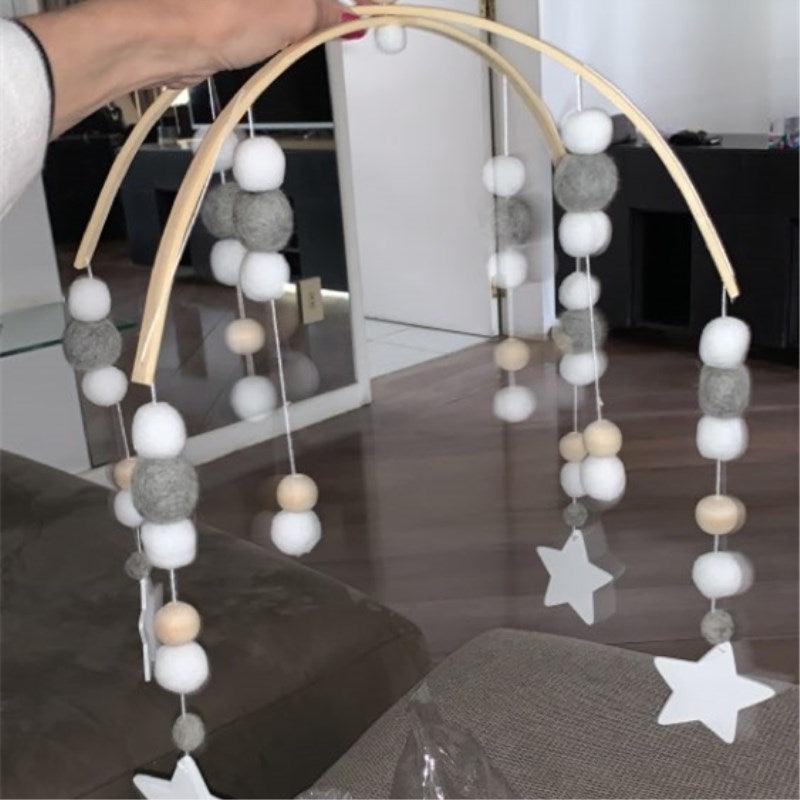 Stevvex crib mobile with Nordic beads and wool balls in white and grey, two star pendants on Tampa Home & Garden Store