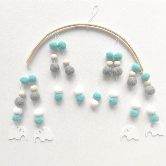 Stevvex Nordic wooden bead wind chime mobile with turquoise, gray and white felt balls on a hoop on Tampa Home & Garden Store