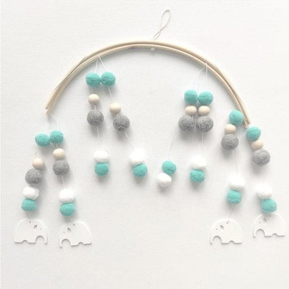 Stevvex Nordic wooden bead wind chime mobile with turquoise, gray and white felt balls on a hoop on Tampa Home & Garden Store