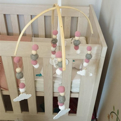 Baby Nordic wooden beads wind chime mobile by Stevvex with pink gray white wool balls for crib on Tampa Home & Garden Store