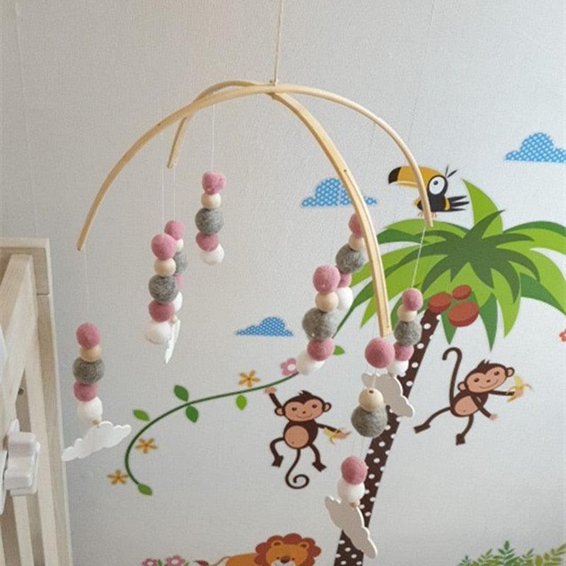Baby Nordic wooden beads wind chime mobile Stevvex with pink white gray wool balls for crib on Tampa Home & Garden Store