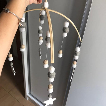 Stevvex Nordic wooden bead wind chime crib mobile with wool balls on Tampa Home & Garden Store
