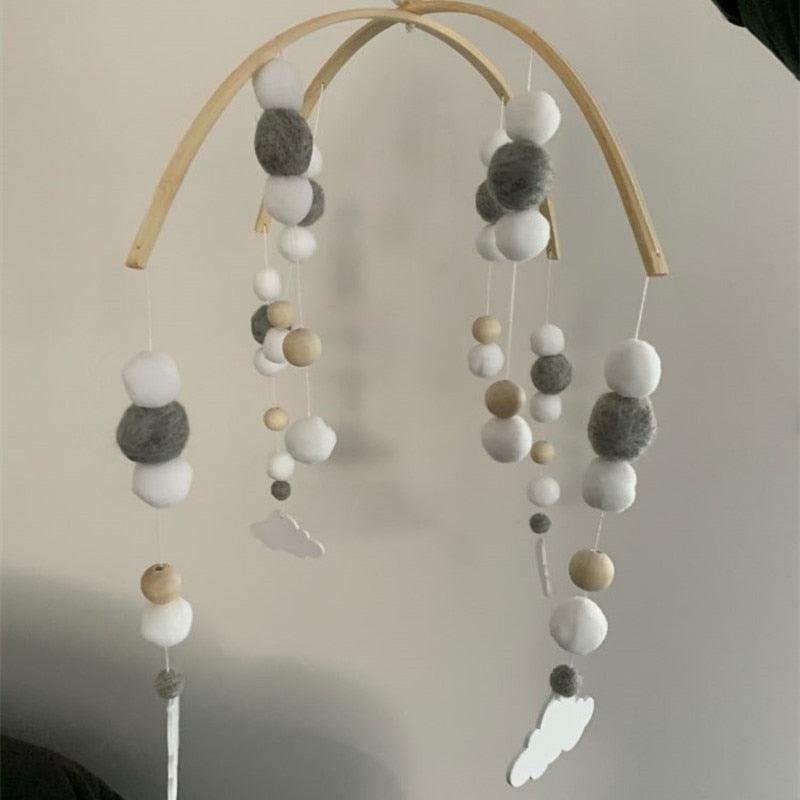 Crib mobile Stevvex Baby Nordic wooden beads wind chime with white/gray wool balls on arch on Tampa Home & Garden Store