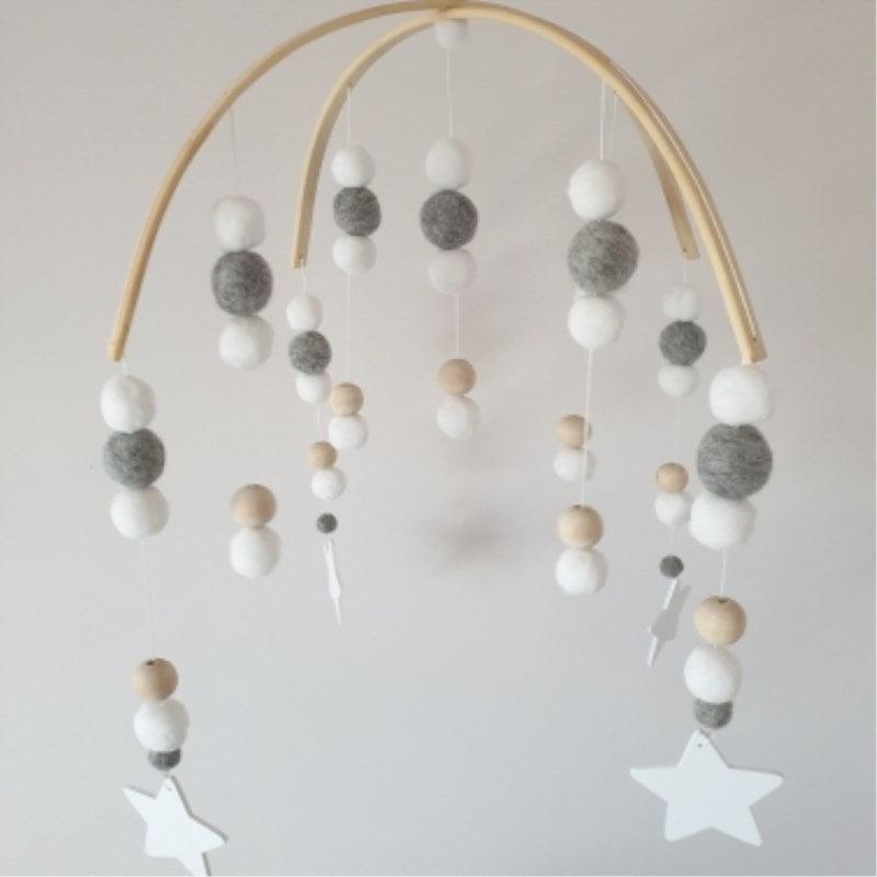 Stevvex crib mobile Baby Nordic wooden beads wind chimes with white gray wool balls on curved wood arch on Tampa Home & Garden Store