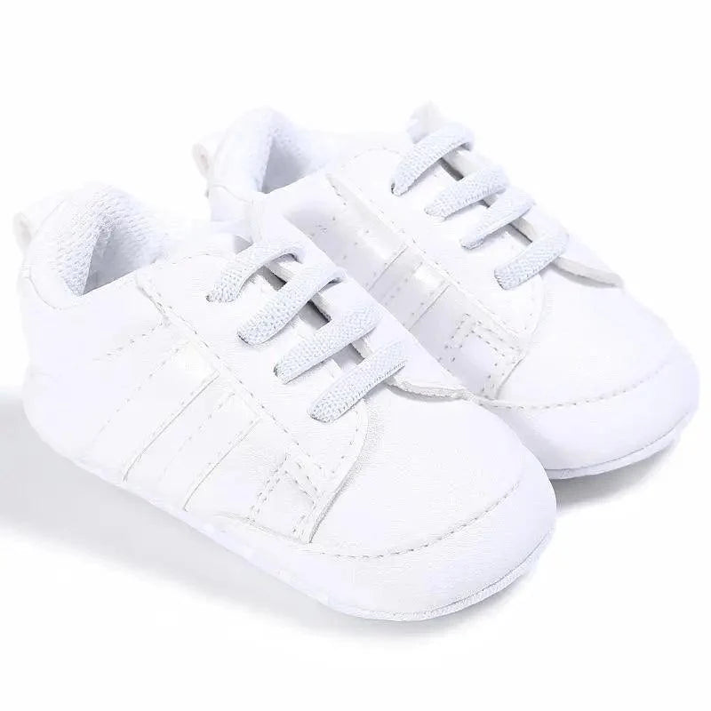 White baby sneakers with laces and soft sole, casual crib shoes on Tampa Home & Garden Store