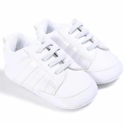 White baby sneakers with laces and soft sole, casual crib shoes on Tampa Home & Garden Store