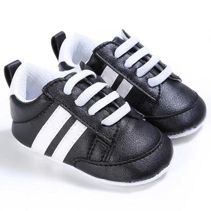 Stevvex baby sneakers pair black PU leather with white stripes soft sole on Tampa Home & Garden Store